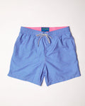 Blue patterned shorts with a pink interior lining on a white background