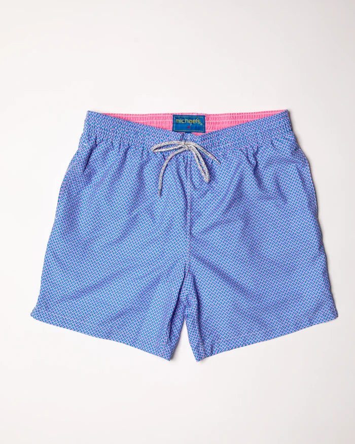 Blue patterned shorts with a pink interior lining on a white background