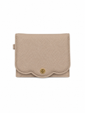 A light beige pebbled leather wallet with a scalloped edge and a small gold logo medallion on the front, shown against a plain white background.