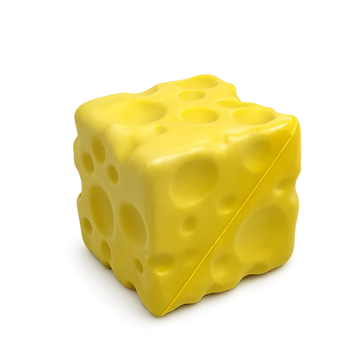 Yellow cube-shaped object resembling cheese on a white background